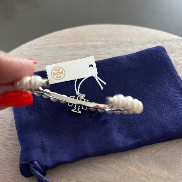 Tory Burch NWT Hinged Elegant Pearl Cuff with Logo Silver Cross w/Dust B… - Picture 5 of 6